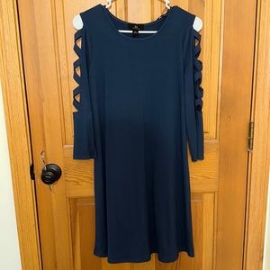 Size XS, navy blue dress. In San Fransisco brand, never worn.